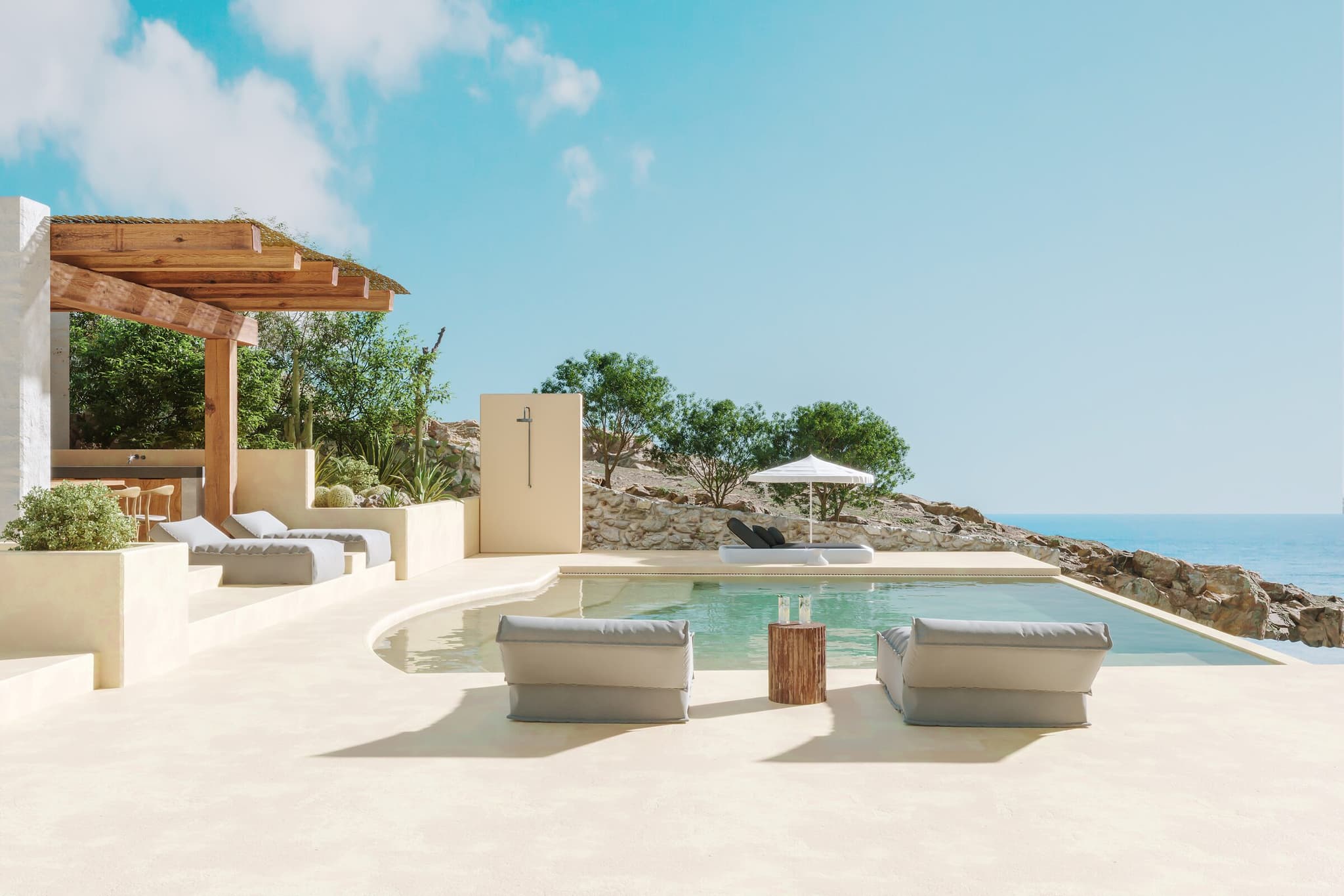 Terrazza con piscina di una villa affacciata sul mare